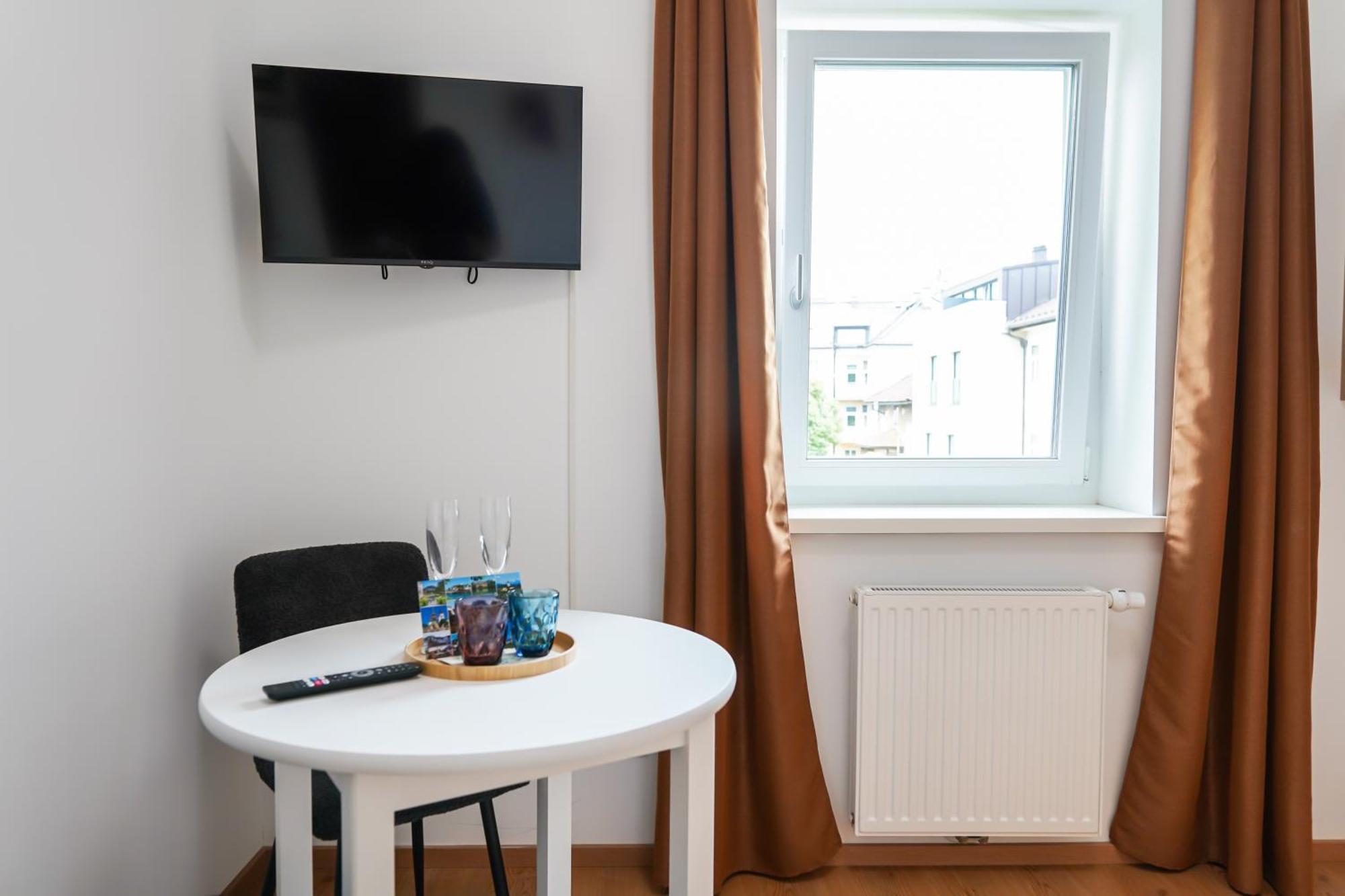 Citysuites Salzburgo Habitación foto
